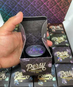 Persy Diamonds Wax 1OZ Jars Baller Box The  epitome of cannabis luxury with Persy Diamonds by 710 Labs. Crafted with precision and passion, Persy Diamonds redefine the standard for cannabis concentrates, delivering an experience that is unparalleled in purity, potency, and flavor. Elevate your senses and indulge in the brilliance of Persy Diamonds, where every puff is a journey to pure euphoria. Key Features of Persy Diamonds: Unmatched Purity: Persy Diamonds are crafted using the finest cannabis flower, meticulously selected for its quality and potency. Through a proprietary extraction process, 710 Labs extracts the purest cannabinoids and terpenes, resulting in concentrates of unparalleled purity. Spectacular Clarity: True to their name, Persy Diamonds dazzle with their crystal-clear appearance. Each diamond-shaped concentrate glistens with brilliance, reflecting the care and precision that goes into its creation. Potent Effects: Prepare for an unforgettable experience as Persy Diamonds deliver potent effects that are both uplifting and euphoric. Whether you’re seeking creative inspiration or relaxation, Persy Diamonds offer a journey to new heights of bliss. Exquisite Flavor Profiles: Indulge your palate with Persy Diamonds’ exquisite flavor profiles, each one a testament to the unique characteristics of the strain from which it was derived. From fruity to floral, spicy to earthy, there’s a Persy Diamond to tantalize every taste bud. Versatile Consumption: Whether dabbed, vaporized, or added to flower, Persy Diamonds offer versatility in consumption, allowing you to customize your experience according to your preferences and mood. Why Choose Persy Diamonds? Crafted with precision and passion by 710 Labs, Persy Diamonds are a testament to excellence in cannabis extraction. Experience the pinnacle of purity, potency, and flavor with Persy Diamonds, where every puff is a journey to pure euphoria. Elevate your cannabis experience to new heights with Persy Diamonds, the ultimate expression of cannabis luxury. Persy Diamonds: Elevate your cannabis experience and indulge in the brilliance of Persy Diamonds by 710 Labs. Whether you’re a seasoned connoisseur or new to concentrates, Persy Diamonds offer a premium experience that is sure to impress. Try Persy Diamonds today and discover a new standard of excellence in cannabis concentrates. Persy Diamonds Wax